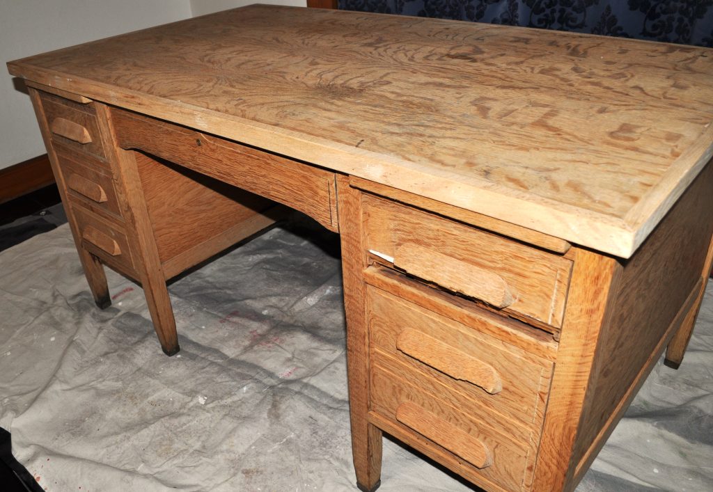 Old unfinished wooden school desk.
