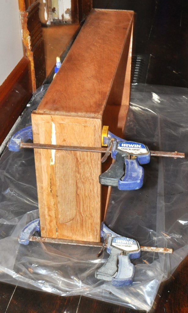 Drawer on side clamped on front for gluing repairs.
